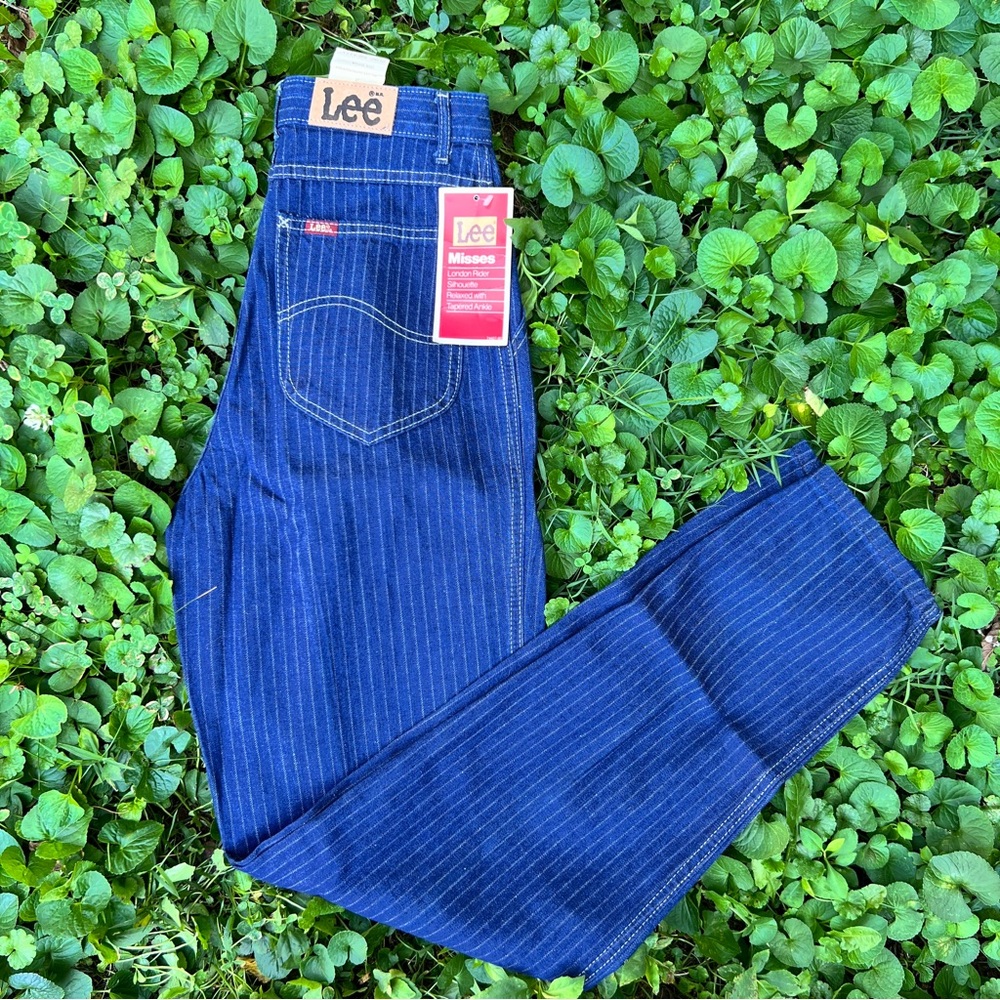 Vintage 1980’s Lee deadstock dark wash conductor stripe pleated jeans
